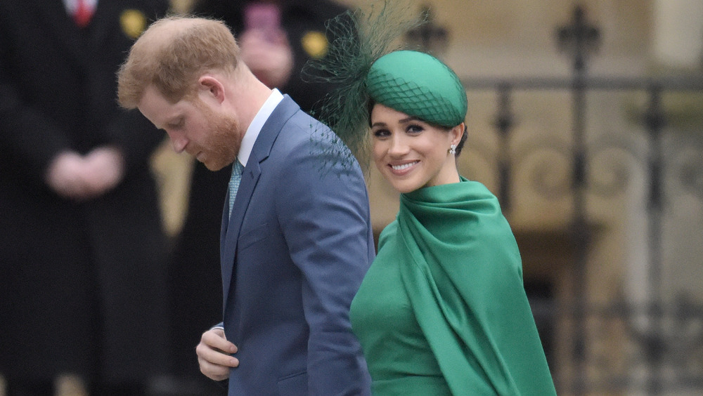 Harry and Meghan Markle walking