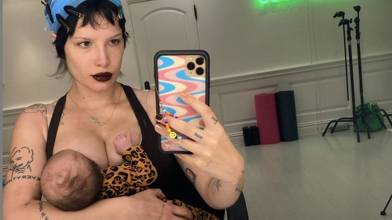 Halsey feeding their child