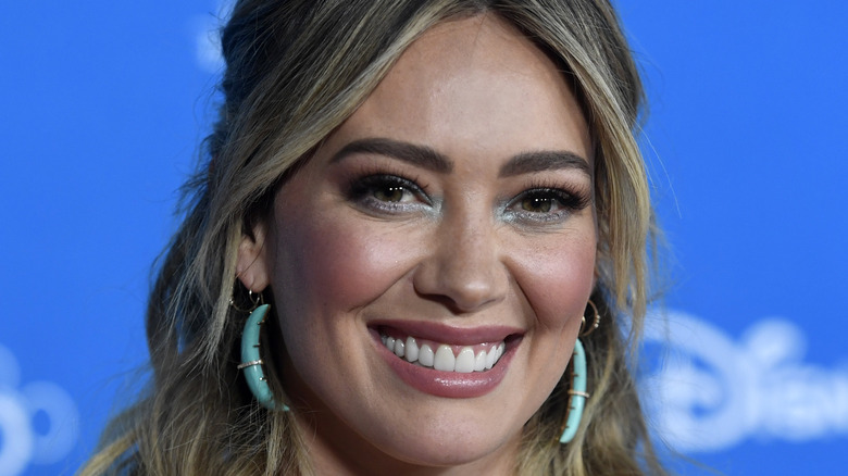 Hilary Duff smiles on the red carpet