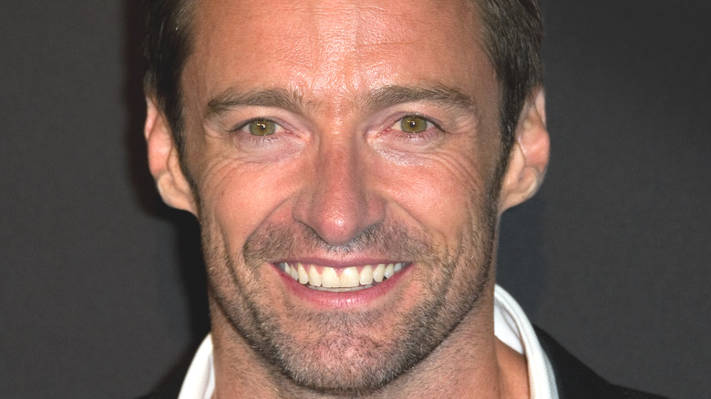 Hugh Jackman smiling at an event