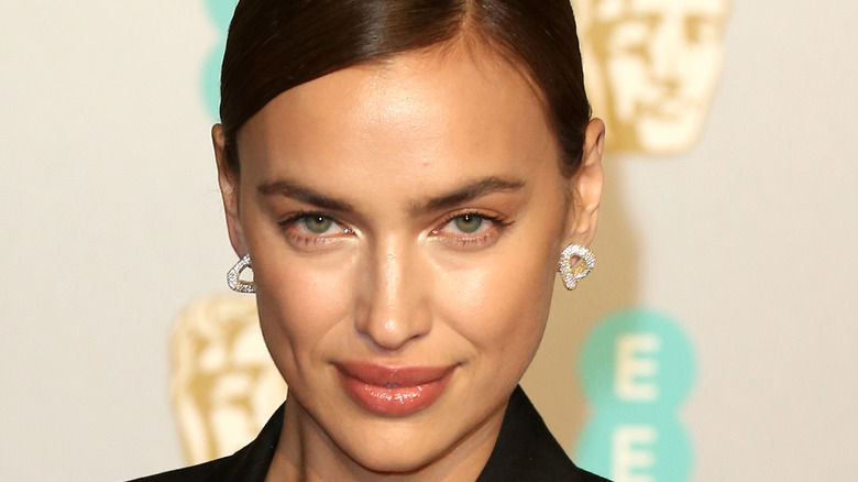 Irina Shayk poses at a red carpet event