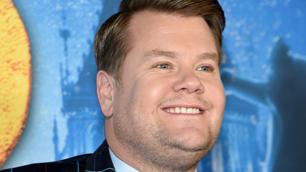 James Corden smiles at premiere