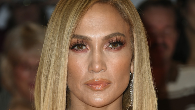 Jennifer Lopez smoldering for cameras at an event promoting "Hustlers"