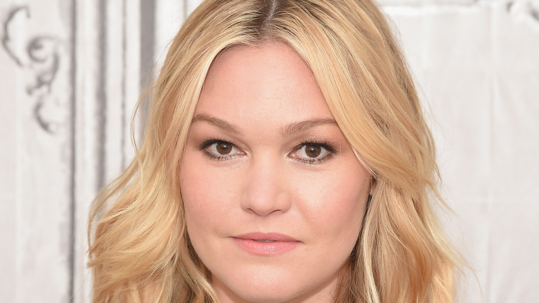 Julia Stiles poses on the red carpet