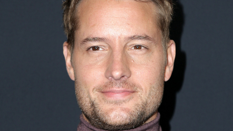 Justin Hartley with a slight smile