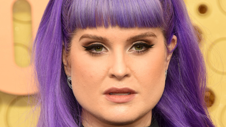 Kelly Osbourne wears a black dress