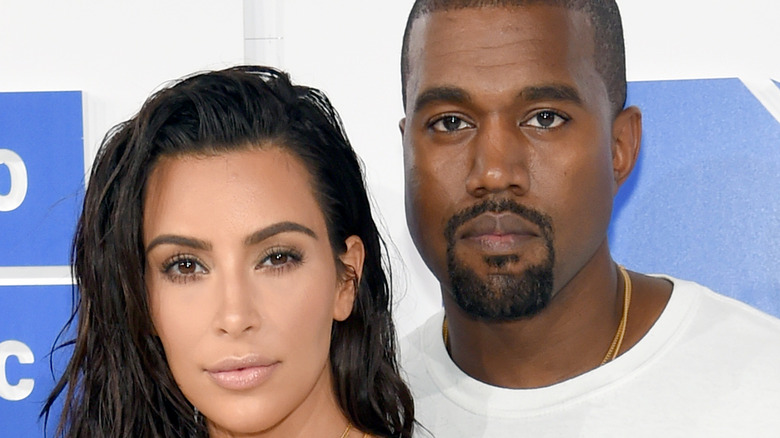 Kim Kardashian and Kanye West at an event. 