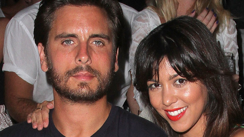 Kourtney Kardashian and Scott Disick at an event. 