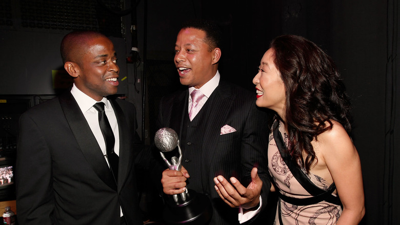 Terrence Howard holding an NAACP image award for "Law & Order: Los Angeles"