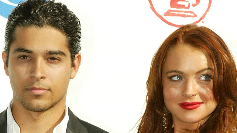 Lindsay Lohan and Wilmer Valderrama pose on the red carpet