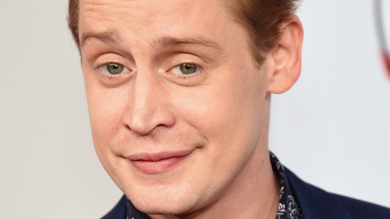 Macaulay Culkin poses on the red carpet