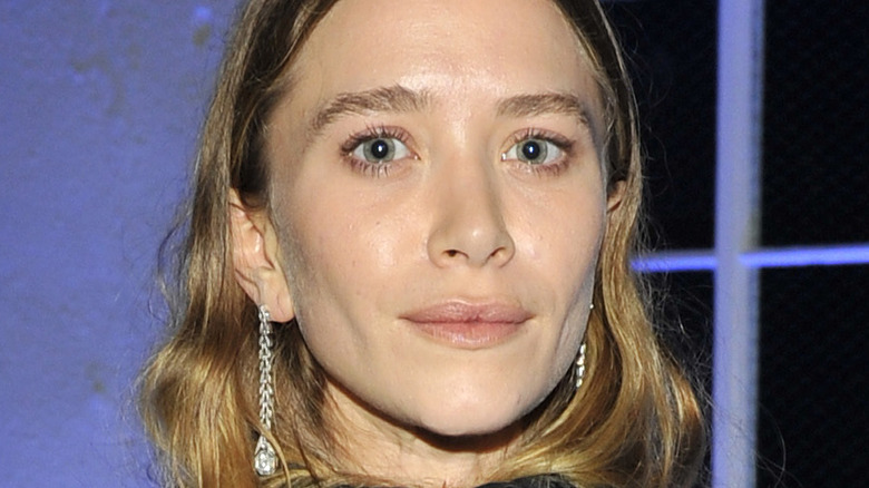 Mary Kate Olsen poses at an event