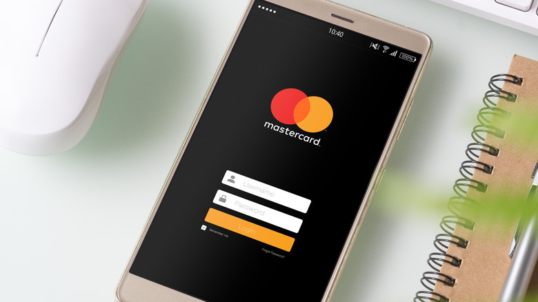 A mobile phone loading the Mastercard app