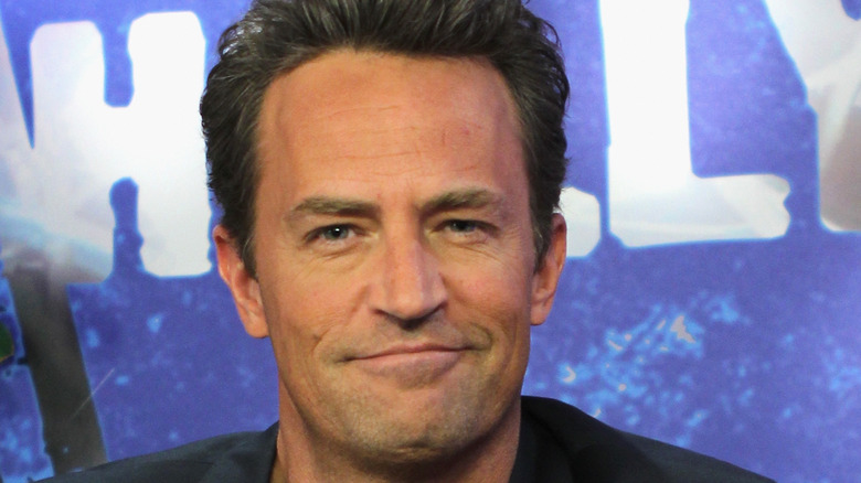 Matthew Perry smiles for the camera. 