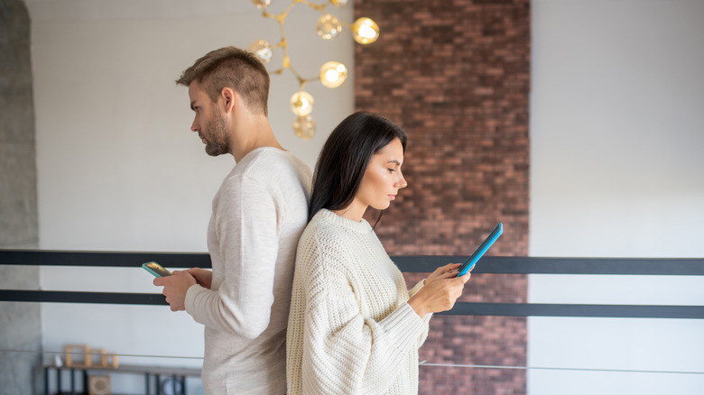 Man and woman not talking to each other 