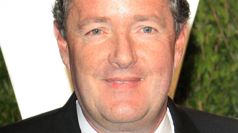 Piers Morgan poses on the red carpet