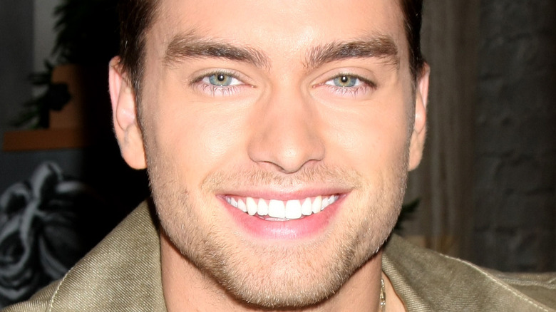 Actor Pierson Fode poses with a smile.