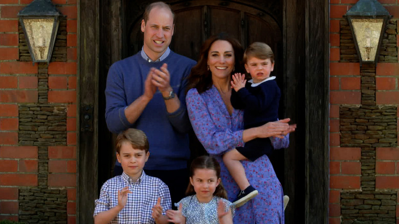 Prince William, Kate Middleton and their kids clapping
