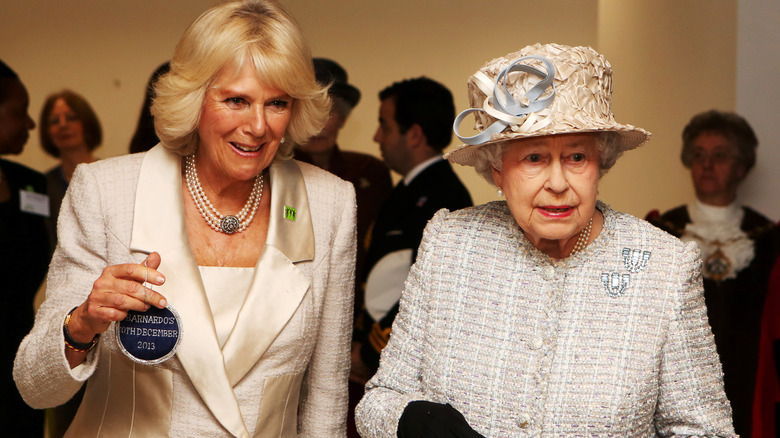 Queen Elizabeth and Camilla Parker Bowles at an event 