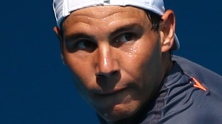 Rafael Nadal playing tennis