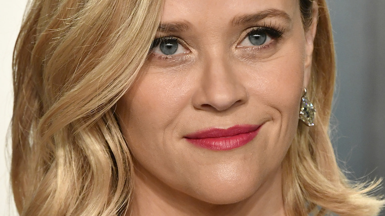 Reese Witherspoon smiling slightly