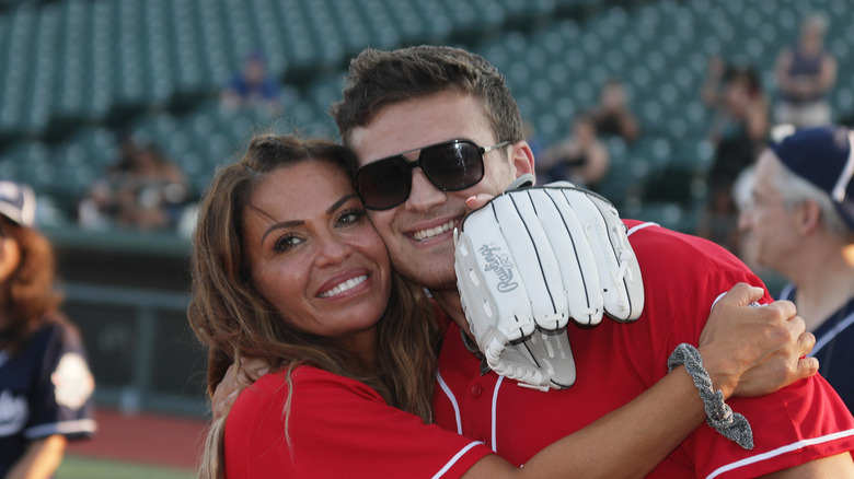 Dolores Catania with son at baseball game