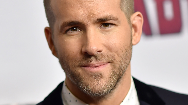 Ryan Reynolds poses at an event