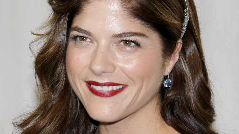 Selma Blair smiles wide at a museum event