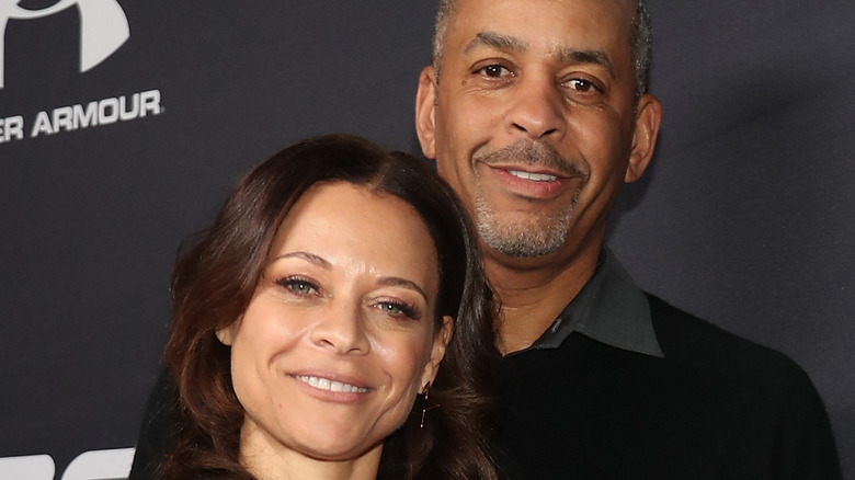 Sonya Curry and Dell Curry at event