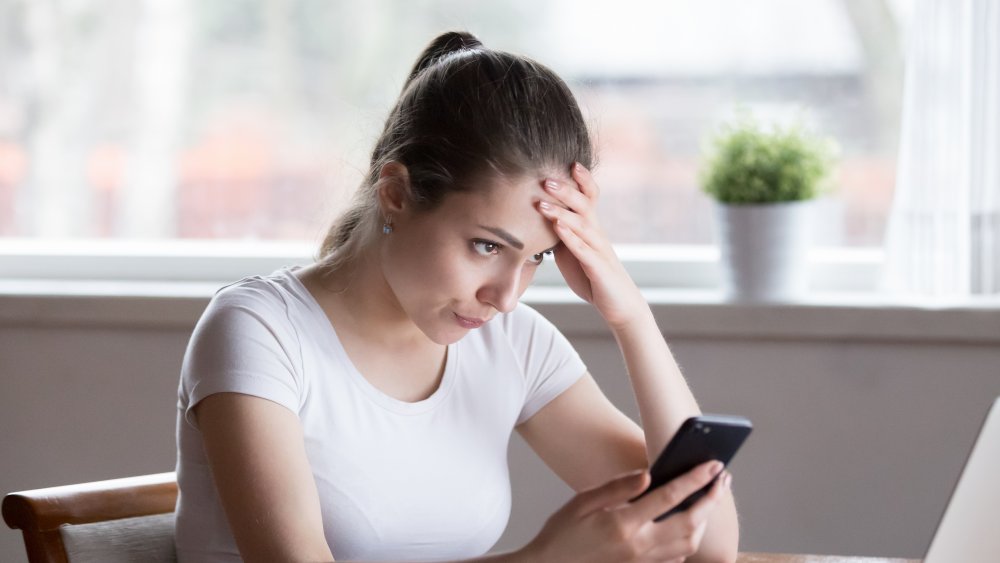 woman staring at her computer