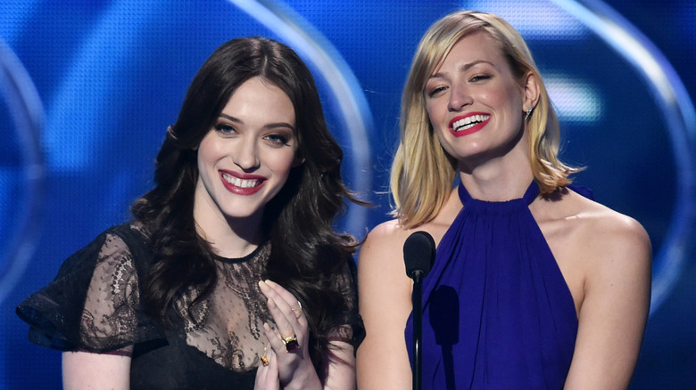 Kat Dennings and Beth Behrs smiling