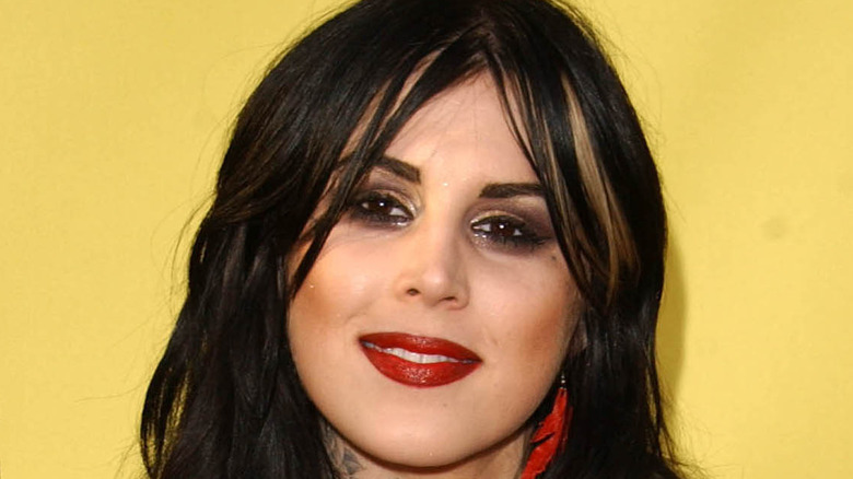 Kat Von D poses on the red carpet