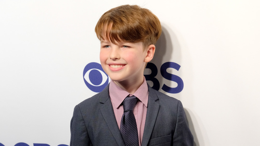 Young Sheldon's Iain Armitage smiling on the red carpet