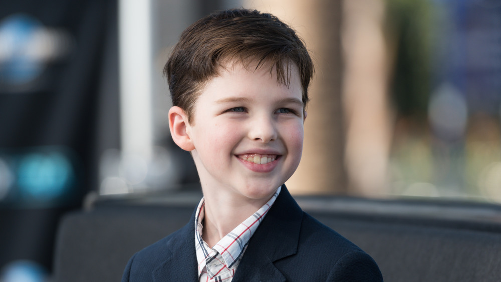 Young Sheldon's Iain Armitage smiling on the red carpet
