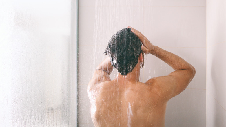 man in shower