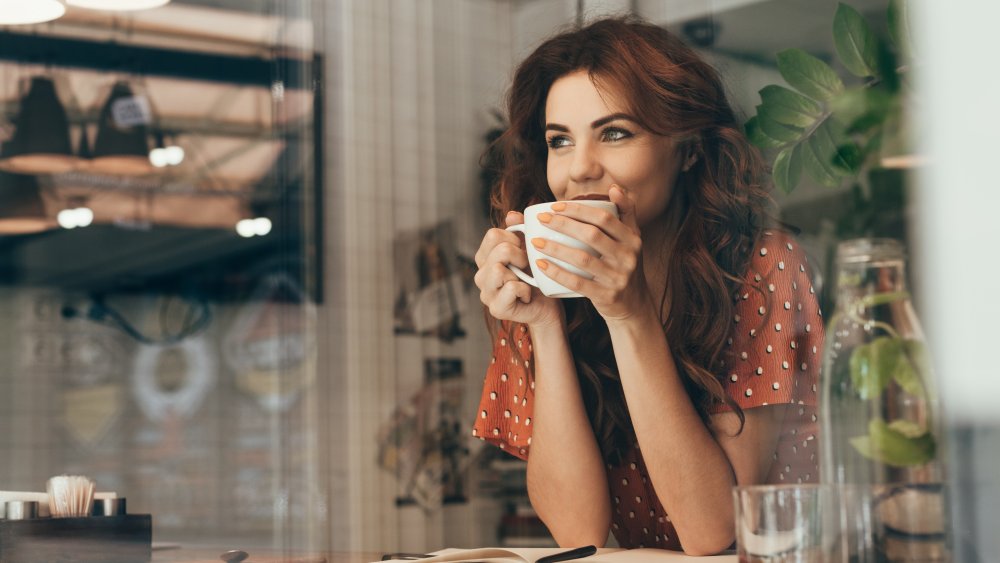 Woman drinking coffee