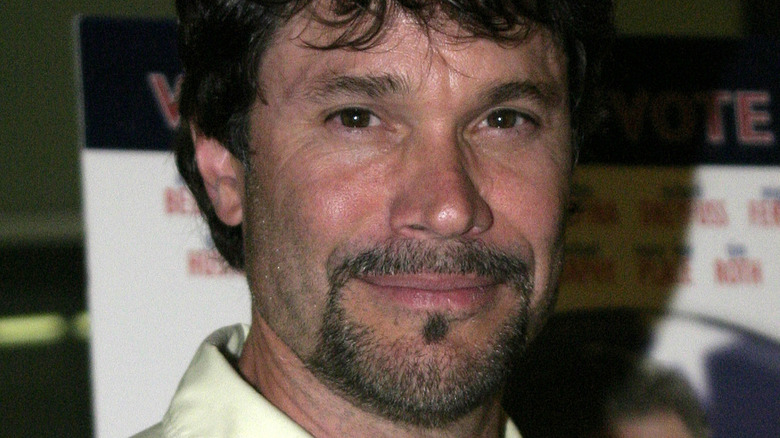 Peter Reckell smiling at an event. 