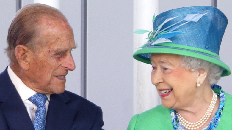 Prince Philip and Queen looking at each other