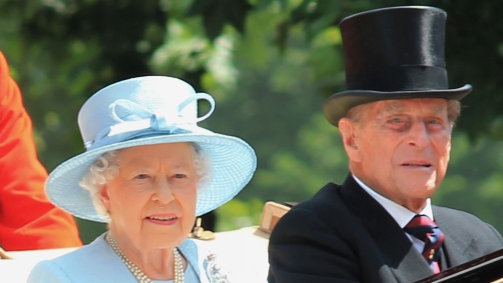 Queen Elizabeth and Prince Philip smiling