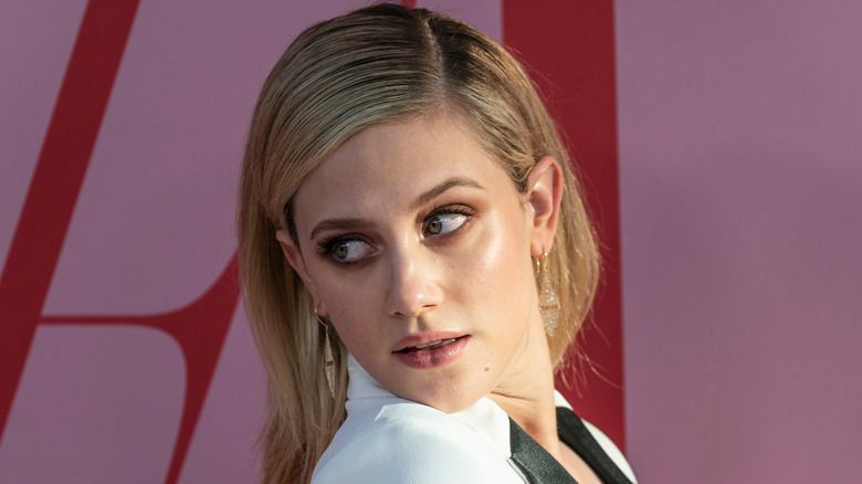 Lili Reinhart on a red carpet 