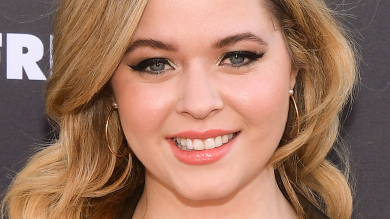 Sasha Pieterse poses on the red carpet