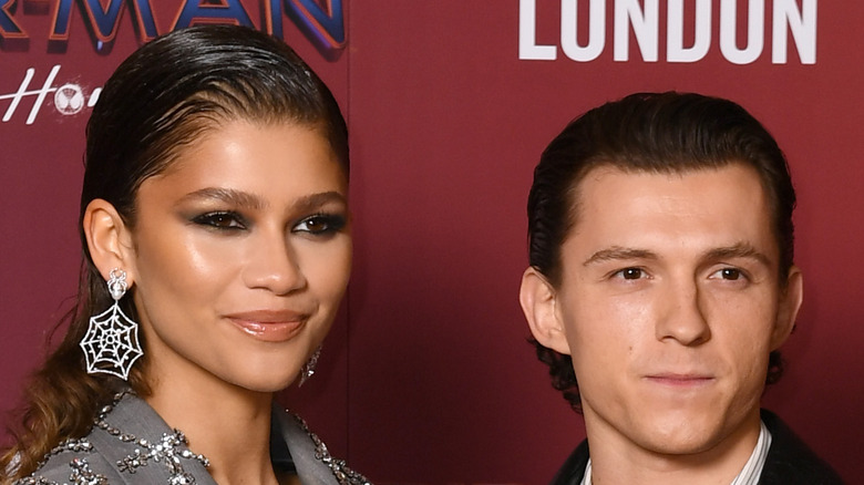 Zendaya and Tom Holland posing on the red carpet