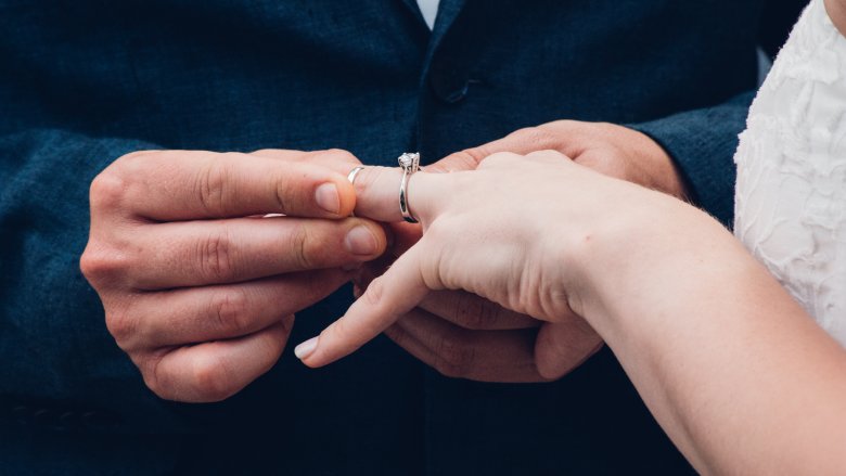 Beautiful Jewish wedding ring on middle finger for Girl Friend