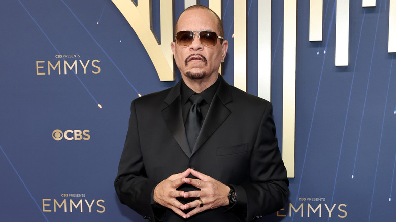 Ice-T making a peculiar shape with his mouth