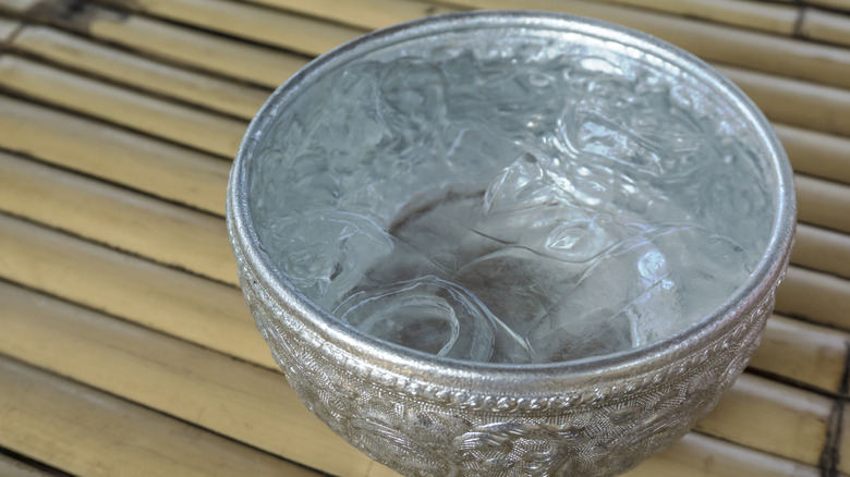 Ice water in metal bowl