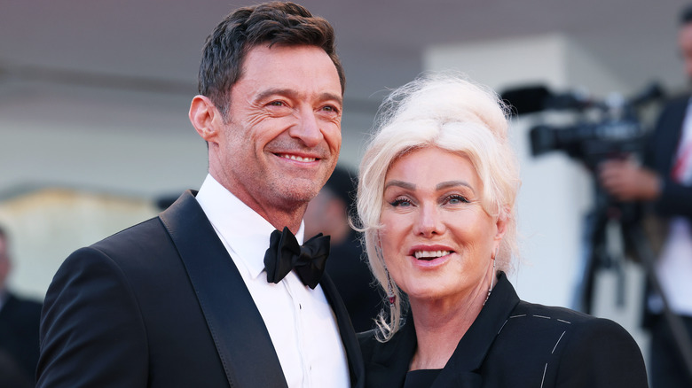 Hugh Jackman and Deborra-Lee Furness smile during movie premiere