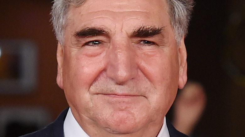 Jim Carter smirking