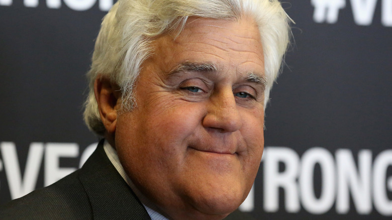 Jay Leno smiles at an event