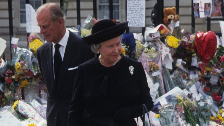 Prince Philip and Queen Elizabeth II wander the Diana memorial