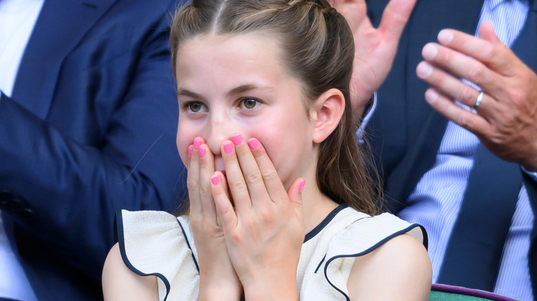 Princess Charlotte shows off her pink nails at Wimbledon